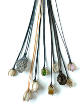 Herkimer diamond caged in bronze