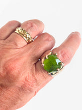 Wide band with Peridot ring