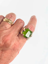 Wide band with Peridot ring