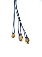 thumbprint brass necklace