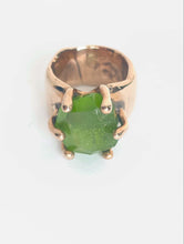 Wide band with Peridot ring