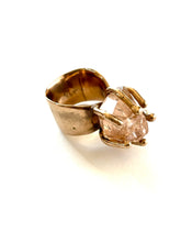 peach topaz claw set ring