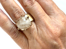 white quartz claw-set ring